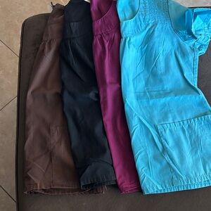 Set of Four size small Scrub Tops in Blue, Purple, Black, and Brown